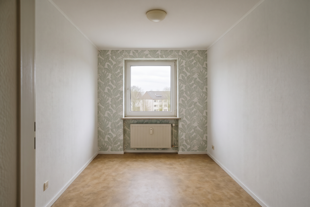Wohnzimmer im Saarland nach der Renovierung — Tapezierarbeiten durch Thomas Jung